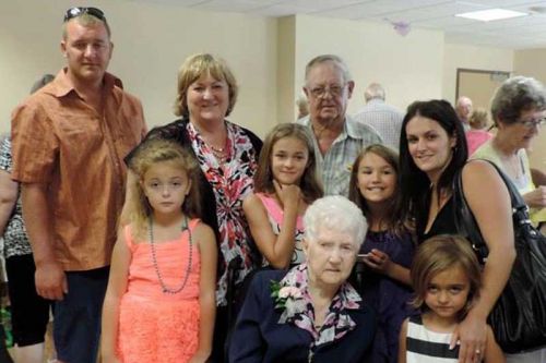 Gwen (Campsall) Leonard; her son Roy Leonard (third from left 3rd row); Roy’s daughter Rozanne Leonard-Stewart (second from left 3rd  row); Rozanne’s son Tyler Stewart (left 3rd row); Tyler’s daughter’s Chloe (left 2nd row) & Keira (on Gwen’s left); Rozanne’s daughter Mallory Stewart (far right 2nd row); Mallory’s daughter’s Paige (second from left 2nd row) & Taylor (third from left 2nd row); Gwen's daughter Margaret is to the right of Mallory.